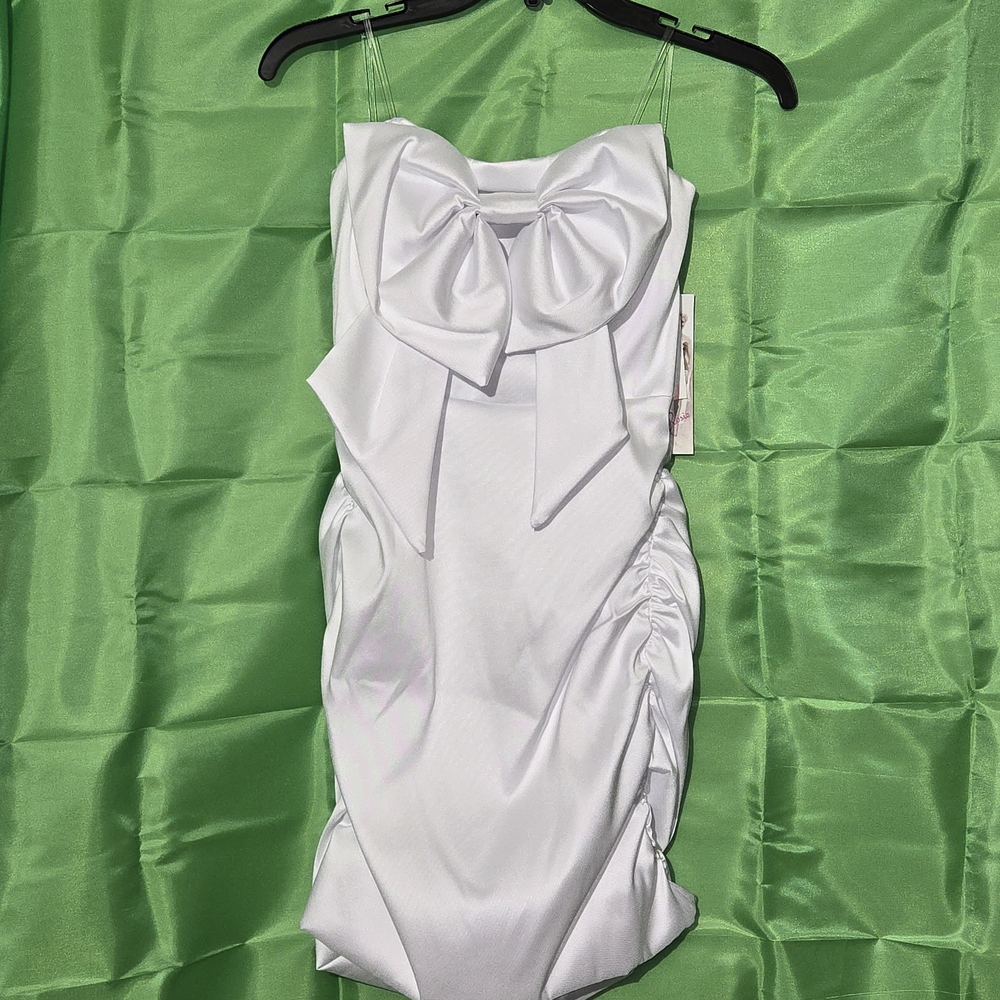 Honey and Rosie White Dress with Bow Accent